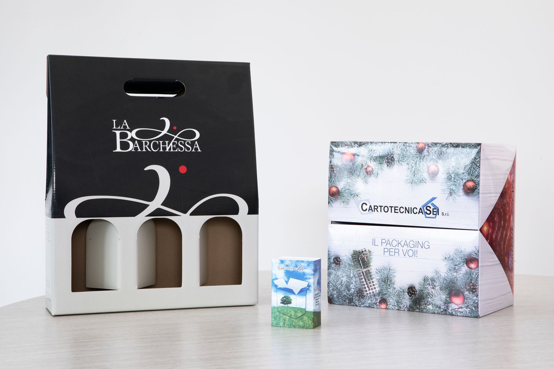 Confezione portabottiglie con maniglia e scatola regalo natalizia